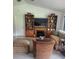 Cozy living room featuring a fireplace, built-in shelving, and comfortable seating at 482 Pendleton Pl, Venice, FL 34292