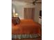 Inviting main bedroom with plush bedding, curtains, and side tables at 482 Pendleton Pl, Venice, FL 34292