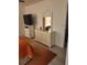 Comfortable main bedroom featuring a dresser and television at 482 Pendleton Pl, Venice, FL 34292