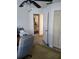 Home office space with view into kitchen and closet space at 482 Pendleton Pl, Venice, FL 34292