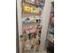 Door pantry featuring wire shelving for convenient storage of food items and household goods at 482 Pendleton Pl, Venice, FL 34292