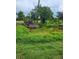 Peaceful pond and lush foliage create a serene natural backdrop at 482 Pendleton Pl, Venice, FL 34292