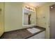 Bathroom featuring a vanity, mirror, sink and towel rack at 527 Walnut Cir, Venice, FL 34285
