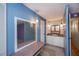 Charming bathroom featuring a vanity, sink, mirror, and decorative lighting fixtures at 527 Walnut Cir, Venice, FL 34285