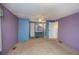 Primary bedroom featuring carpeted floors, ample space, closet and view of the bathroom at 527 Walnut Cir, Venice, FL 34285