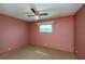 Bedroom with neutral carpet and ceiling fan providing a comfortable space at 527 Walnut Cir, Venice, FL 34285