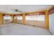 Spacious living area featuring carpet floors, bright walls and natural light at 527 Walnut Cir, Venice, FL 34285