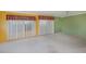 Bright open living room with carpet, large windows, and neutral color scheme at 527 Walnut Cir, Venice, FL 34285