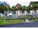 Veterans Park sign surrounded by palm trees and manicured landscaping at 527 Walnut Cir, Venice, FL 34285