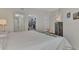 Bedroom features a walk in closet and ensuite bathroom at 5459 Bentgrass Dr # 2-304, Sarasota, FL 34235