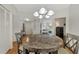 Dining room with a view of the kitchen and living room at 5459 Bentgrass Dr # 2-304, Sarasota, FL 34235