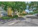 Charming condo community with well-maintained landscaping and ample parking at 5459 Bentgrass Dr # 2-304, Sarasota, FL 34235