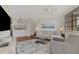 Open living space with view to kitchen, modern decor and lots of light at 5459 Bentgrass Dr # 2-304, Sarasota, FL 34235