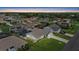 A residential neighborhood featuring single-Gathering homes with well manicured lawns and private pools at 5828 Lincoln Rd, Venice, FL 34293
