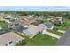 Charming light green home with screened in pool and well maintained lawn at 5828 Lincoln Rd, Venice, FL 34293