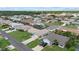 A neighborhood of well maintained homes with beautiful green lawns and mature landscaping at 5828 Lincoln Rd, Venice, FL 34293
