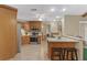 Spacious kitchen with a large island, stainless steel appliances, and ample counter space at 5828 Lincoln Rd, Venice, FL 34293