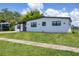 Well-maintained home with modern design, fresh landscaping, and enhanced curb appeal in a great neighborhood at 6821 Marius Rd, North Port, FL 34287