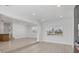 Bright and open living area featuring modern flooring, recessed lighting, and ample natural light at 6821 Marius Rd, North Port, FL 34287