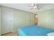 Bedroom with an ensuite bathroom and ample storage space at 738 Riverview Cir, North Port, FL 34287