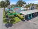 Aerial view of the home, parking, and 751 Capri Isles Blvd address, showcasing its convenient location at 751 Capri Isles Blvd # 108, Venice, FL 34292