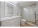 Modern bathroom featuring vanity, toilet, and glass enclosed shower at 751 Capri Isles Blvd # 108, Venice, FL 34292