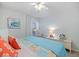 Bright bedroom featuring beach house decor, providing a tranquil atmosphere at 751 Capri Isles Blvd # 108, Venice, FL 34292