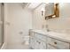 A traditional bathroom featuring a vanity with a marble countertop and backsplash at 844 Senda Plata # 27, Venice, FL 34293