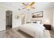 Cozy bedroom featuring a walk-in closet and an en suite bathroom at 844 Senda Plata # 27, Venice, FL 34293