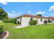 Charming single-story home with a well-maintained lawn and mature landscaping at 844 Senda Plata # 27, Venice, FL 34293