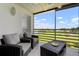 Enjoy this cozy screened balcony with beautiful views of the golf course at 849 Wexford Blvd # 849, Venice, FL 34293