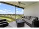Relax on this screened balcony with views of the golf course at 849 Wexford Blvd # 849, Venice, FL 34293