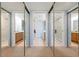 This bathroom boasts mirrored closet doors that amplify space and light at 849 Wexford Blvd # 849, Venice, FL 34293