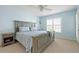 Serene bedroom featuring carpeted floors and a bright window at 849 Wexford Blvd # 849, Venice, FL 34293