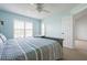 Comfortable bedroom with a cozy atmosphere and carpeted floors at 849 Wexford Blvd # 849, Venice, FL 34293