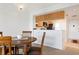 Cozy dining area with table, chairs, and a view into the kitchen at 849 Wexford Blvd # 849, Venice, FL 34293
