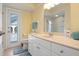 Bright bathroom with a spacious vanity and a convenient shower at 925 S Doral Ln, Venice, FL 34293