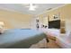 Comfortable bedroom featuring a ceiling fan, and natural light at 925 S Doral Ln, Venice, FL 34293
