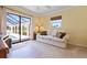 Cozy living area with sliding glass doors leading to the pool at 925 S Doral Ln, Venice, FL 34293