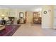 Open-concept living area featuring tile floors and views to dining room at 925 S Doral Ln, Venice, FL 34293