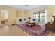 Inviting living room with neutral walls, tile flooring, and stylish furnishings at 925 S Doral Ln, Venice, FL 34293