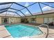 A beautiful, screened-in pool offering plenty of space for outdoor relaxation and recreation at 925 S Doral Ln, Venice, FL 34293