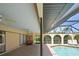 Large pool area features a screened-in enclosure, and ample patio space at 925 S Doral Ln, Venice, FL 34293