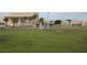 Venice Performing Arts Center features well-manicured grounds, palm trees, and modern architecture at 9917 Haze Dr, Venice, FL 34292