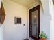 The decorative glass front door offers charm at the entrance of this home at 9917 Haze Dr, Venice, FL 34292
