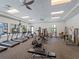 Well-equipped gym with treadmills, exercise bikes, and weight machines for a complete workout at 9917 Haze Dr, Venice, FL 34292