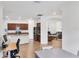 Open floor plan showing the kitchen and living area with neutral colors at 10061 Cozy Grove Dr, Venice, FL 34293
