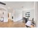 Bright and open office area with workspace, tile flooring, and natural light at 10061 Cozy Grove Dr, Venice, FL 34293