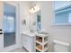 Modern bathroom showcasing a vanity, mirror, and toilet at 11560 Tapestry Ln, Venice, FL 34293