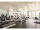 Spacious gym equipped with modern fitness equipment and natural light at 11560 Tapestry Ln, Venice, FL 34293